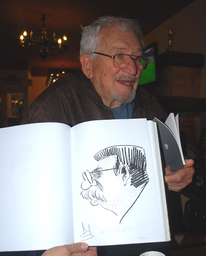 Egy portrékarikatúra az albumból. Fotó: Fábry János (2012)