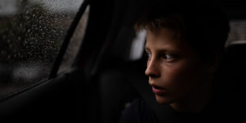 The images document his everyday life, interactions with family, and moments of his daily routine and play highlighting individuality and human experience.